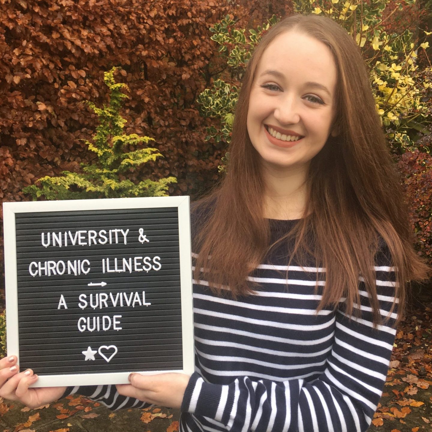 headshot of pippa outdoors, smiling and holding letterboard sign reading 'university and chronic illness: a survival guide'