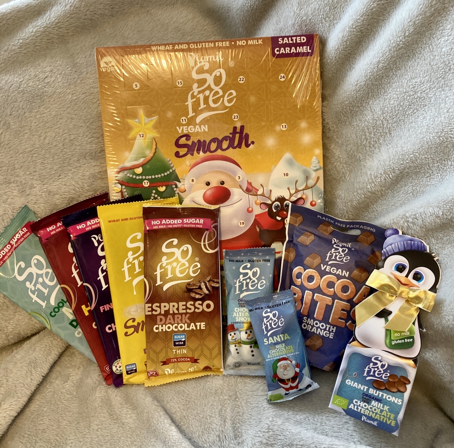 plamil's festive range, including salted caramel advent calendar, selection of colourful 'so free; chocolate bars, santa chcolate shapes, penguin box of chocolate buttons and packets of cocoa bites