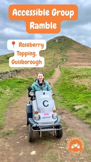 Pippa on a Disabled Ramblers Tramper Trip, with Roseberry Topping in the background.